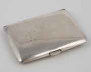 An antique Continental silver cigarette case with risqu&eacute; enamel scene of a female nude with pearls and red drapery, circa 1920, interior engraved with "Temporada Lirica Alemana, 1922", 9cm high. - 2