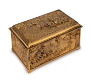 An antique Continental gilt bronze&nbsp;jewellery casket decorated with romantic scenes, 19th/20th century, 7.5cm high, 14.5cm wide, 10cm deep