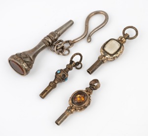 Four assorted antique pocket watch keys, 19th century, the largest 4cm long