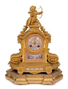 An antique French gilt spelter figural mantle clock with SEVRES French pink porcelain dial and inset panels, eight day time and bell striking movement, resting on original plinth base, 19th century, 40cm high overall.