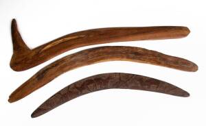 BOOMERANGS: Group of 3, includes Sth Australian with pecked carved kangaroo design (46cm); West Australian with 1936 inscription (59cm); hooked boomerang Central Australia (64cm)