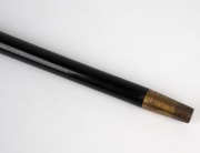 An antique walking stick with carved marine ivory snake and fist hand grip, ebony shaft and brass ferrule, 19th century, ​​​​​​​83cm high. - 5