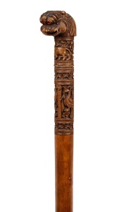 An antique South Asian walking stick with carved peacocks and leopard head handle,19th/20th century, 90cm high.