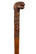 An antique South Asian walking stick with carved peacocks and leopard head handle, 19th/20th century, 90cm high. - 2