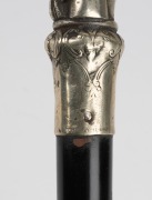 An antique walking stick with silver plated figural handle, ebonised timber shaft and brass ferrule, 19th century, 88cm high. - 4