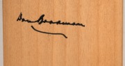 Don Bradman's original signature on a full-size Gray-Nicolls cricket bat, featuring photograph of Bradman and career statistics; length 83 cm. - 2