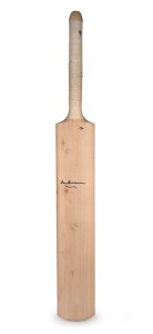 Don Bradman's original signature on a plain full-size willow cricket bat; length 85cm.