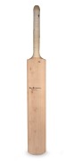 Don Bradman's original signature on a plain full-size willow cricket bat; length 85cm.