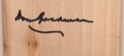 Don Bradman's original signature on a plain full-size willow cricket bat; length 85cm. - 2