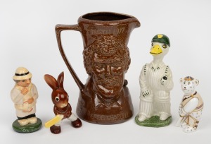 March 1977 Centenary Test character jug by Bendigo Pottery featuring heads of Greg Chappell and Tony Greig, together with four smaller ceramic figurines; the tallest 17cm. (5 items)