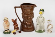 March 1977 Centenary Test character jug by Bendigo Pottery featuring heads of Greg Chappell and Tony Greig, together with four smaller ceramic figurines; the tallest 17cm. (5 items)