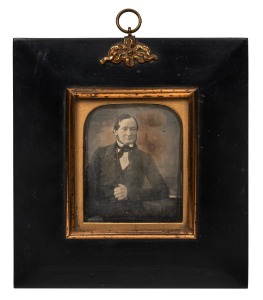 RICHARD BEARD (1801-1885), daguerreotype photograph of an unknown sitter, circa 1840s, housed in original frame and bearing remains of original paper label verso, ​​​​​​​16 x 15cm overall.