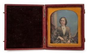 ANTOINE FRANCOIS JEAN CLAUDET (1797&ndash;1867) daguerreotype portrait photograph of a lady with hand-coloured embellishment, mid 19th century, housed in original bi-fold leather case with embossed retailer's crest on the front. French born, Claudet was a pione