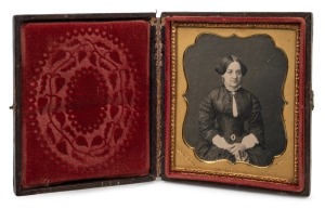 RUFUS ANSON daguerreotype portrait photograph of a lady in original bi-fold leather case with gilt metal mount stamped "ANSON, 589, BROADWAY", 19th century. Anson operated at this New York address between 1851 and 1867. 9.5 x 8.5cm overall when closed.