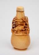 A Chinese ivory scent bottle with pierced and carved marine decoration adorned with fish swimming in reeds, square seal mark to base, 19th/20th century, 8.5cm high. - 3