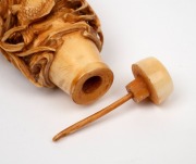 A Chinese ivory scent bottle with pierced and carved marine decoration adorned with fish swimming in reeds, square seal mark to base, 19th/20th century, 8.5cm high. - 5