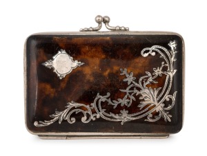 An antique tortoise shell bi-fold calling card case inlaid with silver decoration and lined in magenta silk with compartments, 19th century, 9cm wide.