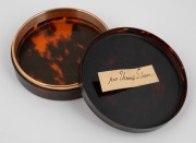 An antique circular tortoise shell box adorned with a fine quality oval miniature hand-painted portrait of SIR THOMAS GIBSON surrounded by rose gold mount, the base additionally trimmed in rose gold, and bearing paper inscription under the lid, 18th/19th - 2