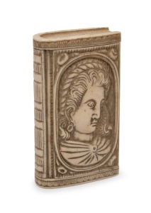 An antique carved ivory snuff box in book form with male and female portraits, 18th/19th century, 7.5cm high.