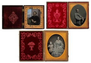 Three antique ambrotype photographs in original cases, one attractively hand-coloured, 19th century, ​​​​​​​the largest 15 x 12cm overall.