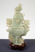 Three Chinese carved jade ornaments, 20th century, the lidded pot 16cm high overall. - 3