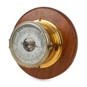 SCHATZ German compensated precision barometer thermometer, mounted on circular timber board, mid 20th century, 26cm diameter overall.