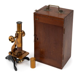Brass and steel microscope, 19th century, 28.5cm at highest setting, in timber box with miniature drawer (key present).