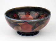 MOORCROFT "Pomegranate" pottery bowl on blue ground, impressed "Moorcroft, Made In England", 7cm high, 16cm diameter. - 2