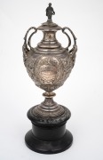 An antique cast sterling silver polo trophy, on ebonized wooden plinth, 19th century, 20cm high, 25cm high overall, 351 grams (not including base). - 2