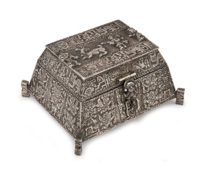 A vintage South American silver casket in the Aztec style, lined in plush blue velvet, 20th century, 7cm high, 14cm wide, 12cm deep, 659 grams total.