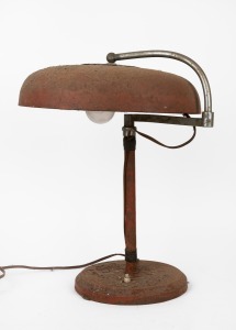 A vintage desk lamp with articulated arm in the Bauhaus style, early to mid 20th century. Note: Barn find condition. 45cm high.