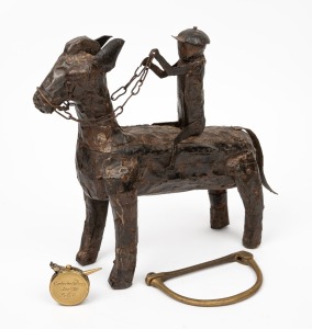 A copper horse and jockey statue; together with a brass kit bag lock and a vintage lawn bowls measuring tape, (3 items), ​​​​​​​the statue 28cm high, 30cm long.