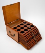 An antique coin collector's cabinet, crafted in oak with fall front revealing a bank of twelve coin slide storage drawers, 19th/20th century, 17cm high, 28m wide, 28cm deep. - 3