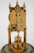 GUSTAV BECKER 400 day anniversary clock with rotary disk pendulum, under glass dome, early 20th century, 29cm high overall. - 2
