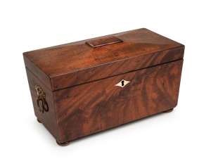 An antique English mahogany tea caddy with inlaid bone escutcheons and gilt metal handles, early to mid 19th century, 18cm high, 31cm wide, 16cm deep.