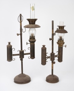 A pair of antique copper and glass adjustable student/study oil lamps, 19th/20th century, the larger 47cm high overall.