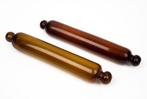 Two antique English glass rolling pins, 19th century, 35cm wide.