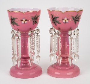 A pair of antique English pink glass mantle lustres, 19th century, 24.5cm high.