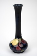 MOORCROFT "Wisteria" pattern English pottery stem vase on blue ground, impressed "Moorcroft, Made in England", ​​​​​​​18cm high. - 2