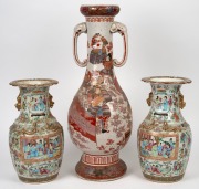 An antique Japanese porcelain mantle vase with samurai decoration and elephant handles; together with a pair of antique Chinese famille rose export ware porcelain vases, (A/F), 19th century, the largest 58cm high. - 2