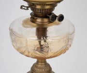 An antique banquet lamp with clear cut crystal font, black button double burner, acid etched peach shade and brass column bird cage base, 19th century, 77cm high overall. - 3
