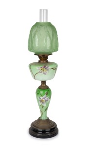An antique banquet lamp with hand-painted green glass font and column in the Art Nouveau style with double burner, acid etched shade and chimney, 19th/20th century, 75cm high.