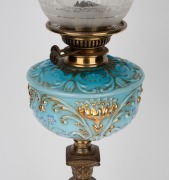 A banquet lamp, blue glass font with gilt and floral enamel highlights, black button double burner with acid etched shade and Corinthian column base, 19th century and later, 79cm high. - 3