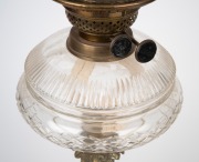 An antique oil lamp with clear cut crystal font, double black button burner, acid etched shade with brass and black glass base and chimney, 19th century, 76cm high. - 2