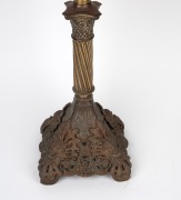 An oil lamp with faceted ruby glass shade, black button double burner and acid etched glass shade, 19th century and later, 76cm high. - 3