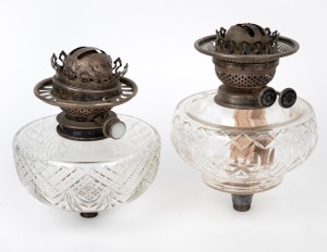 Two antique cut crystal oil lamp fonts, attractive silver plated mounts and fittings with single and double button burners,19th century.