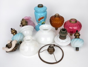 ANTIQUE OIL LAMP PARTS including blue piano light fonts and burners, pink piano light shade, assorted milk glass oil lamps and burners, 19th century, (qty), the largest 25cm high.