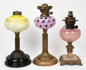 Three oil lamp bases with fonts, (incomplete, parts only), the largest 40cm high.