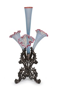An antique vaseline glass four trumpet epergne on silver plated base, 19th century, 42cm high.