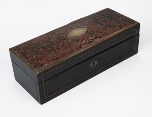 An antique French Boulle glove box with fall front and birdseye maple interior, 19th century, 8cm high, 26.5cm wide, 10cm deep.